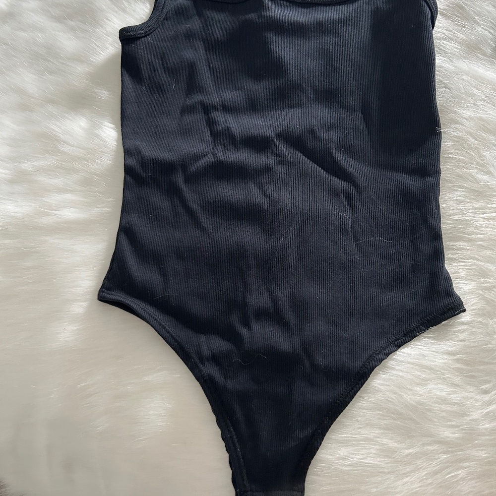 Brunette Ribbed Body Suit Never Worn